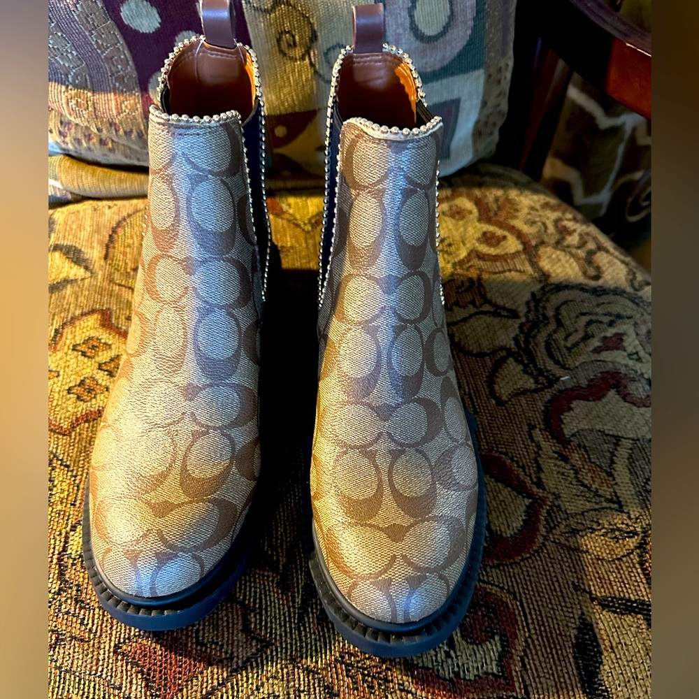 Brand new without tags gorgeous monogram Coach booties. Size 7.